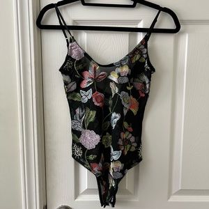 NWT Mesh Bodysuit with floral embroidery, snap closures.